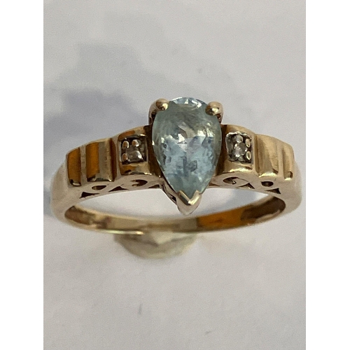 7 - Classic 9 carat GOLD and AQUAMARINE RING. Consisting a Pear Cut AQUAMARINE mounted to top with stunn... 