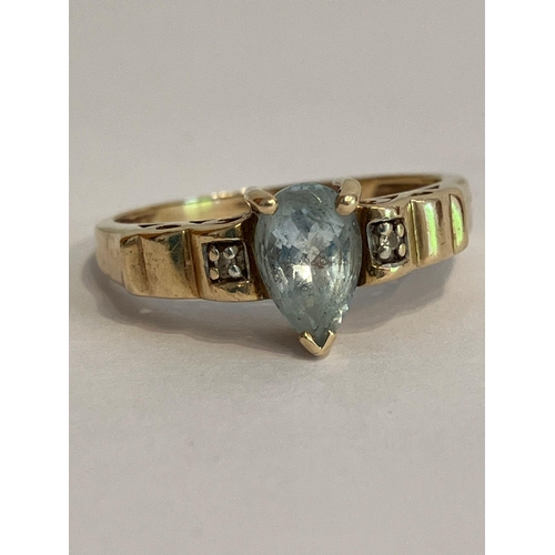 7 - Classic 9 carat GOLD and AQUAMARINE RING. Consisting a Pear Cut AQUAMARINE mounted to top with stunn... 