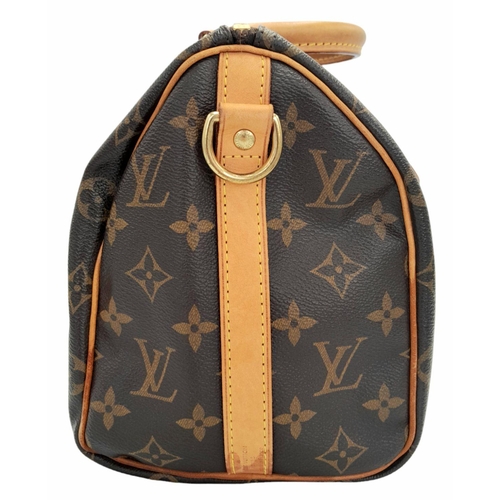 177 - A Louis Vuitton Speedy Bag. Monogramed canvas exterior with gold-toned hardware, two rolled leather ... 