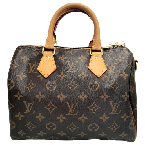 177 - A Louis Vuitton Speedy Bag. Monogramed canvas exterior with gold-toned hardware, two rolled leather ... 