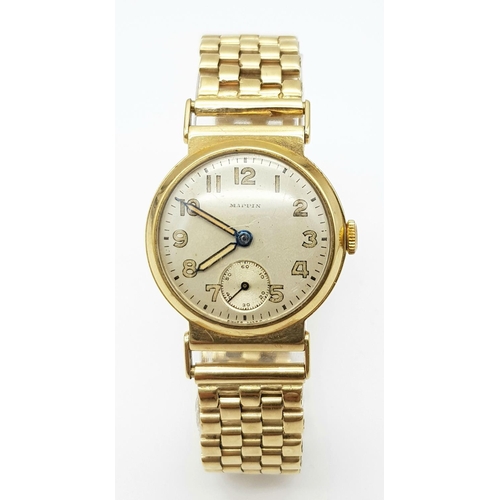 185 - A Vintage (1950s) Mappin and Webb 9K Gold Watch. 9K gold bracelet and case - 28mm. Patinated dial wi... 