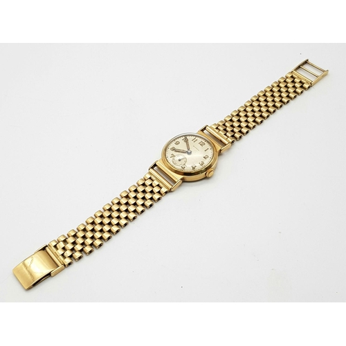 185 - A Vintage (1950s) Mappin and Webb 9K Gold Watch. 9K gold bracelet and case - 28mm. Patinated dial wi... 