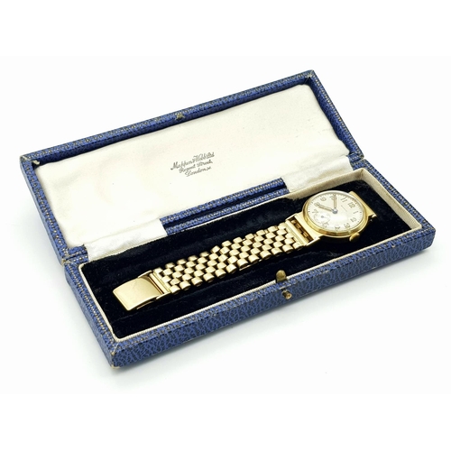 185 - A Vintage (1950s) Mappin and Webb 9K Gold Watch. 9K gold bracelet and case - 28mm. Patinated dial wi... 