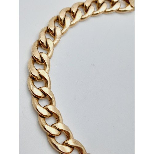 116 - A 9K Yellow Gold Flat Curb Link Bracelet. 19cm. 6.1g weight.