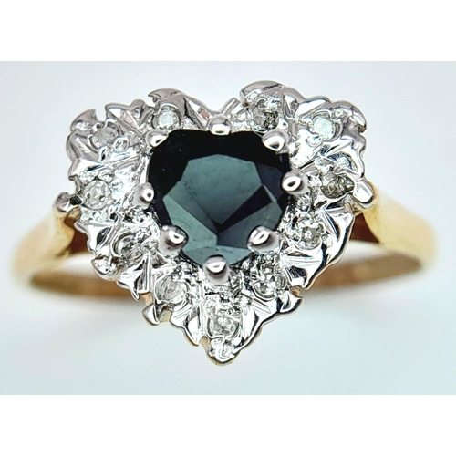 551 - A 9K YELLOW GOLD DIAMOND & SAPPHIRE HEART CLUSTER RING 2.3G SIZE N.

ref:SPAS 9005