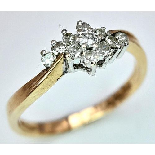 557 - A 9K YELLOW GOLD DIAMOND CLUSTER RING 0.20CT. 1.6G SIZE J 1/2.

ref: SPAS 9007