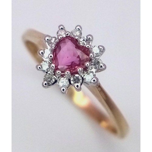 564 - A 9K YELLOW GOLD DIAMOND & PINK SAPPHIRE HEART RING 1.6G SIZE N.

ref: SPAS 9010