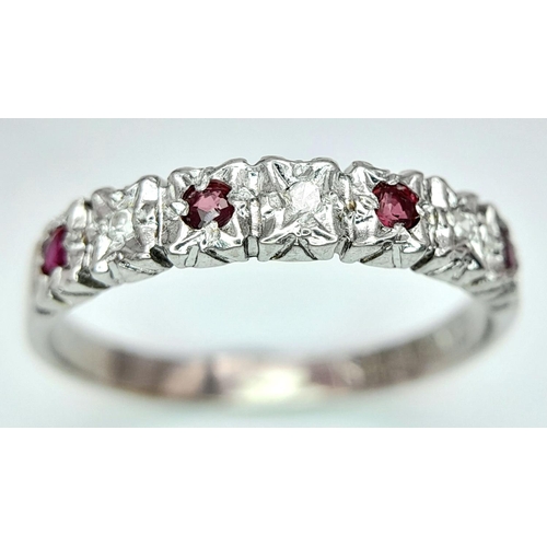 585 - A 9K WHITE GOLD DIAMOND & RUBY BAND RING 1.8G SIZE N 1/2.

ref: SPAS 9014