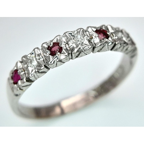 585 - A 9K WHITE GOLD DIAMOND & RUBY BAND RING 1.8G SIZE N 1/2.

ref: SPAS 9014