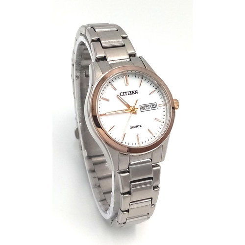 555 - A Citizen Quartz Ladies Watch. Stainless steel bracelet and case - 28mm. White dial with day/date wi... 