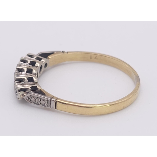 562 - A Vintage 18K Gold and Platinum Five Diamond Ring. Size Q. 2.9g total weight.