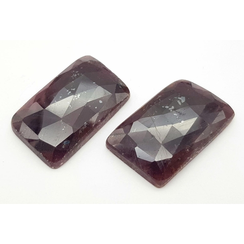 137 - Two Mozambique Untreated Rubies - Both AIG Certified. 69 and 70ct.