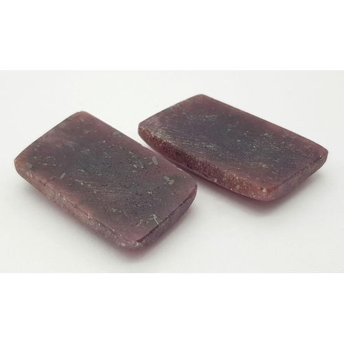 137 - Two Mozambique Untreated Rubies - Both AIG Certified. 69 and 70ct.