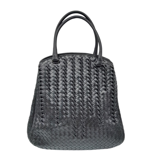 138 - A Bottega Veneta Black Bag. Intrecciato leather exterior with two rolled leather handles. Beige text... 
