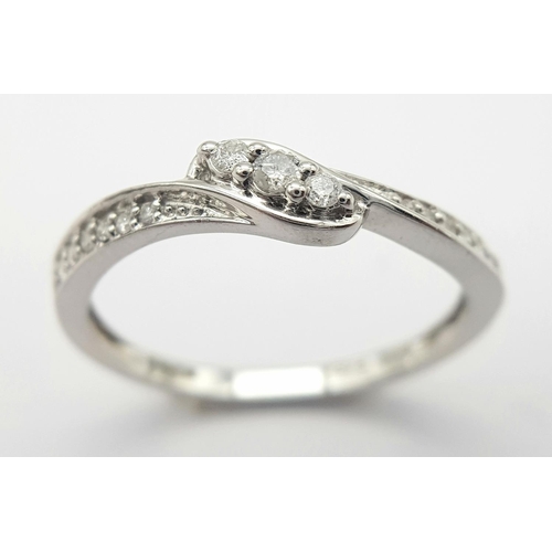 53 - A 9K WHITE GOLD DIAMOND RING 0.15CT 1.9G SIZE P.

SC 9009