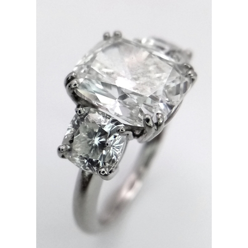 56 - A Breathtaking 4.01ct GIA Certified Diamond Ring. A brilliant cushion cut 4.01ct central diamond of ... 