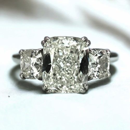 56 - A Breathtaking 4.01ct GIA Certified Diamond Ring. A brilliant cushion cut 4.01ct central diamond of ... 