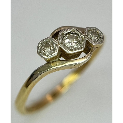 2 - AN 18K YELLOW GOLD & PLATINUM VINTAGE DIAMOND 3 STONE TWIST RING. 2.5G. SIZE N.