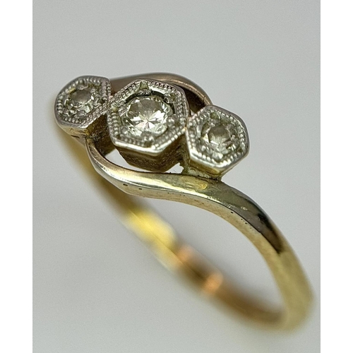 2 - AN 18K YELLOW GOLD & PLATINUM VINTAGE DIAMOND 3 STONE TWIST RING. 2.5G. SIZE N.