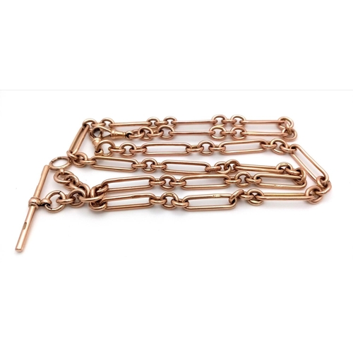 37 - A 9K ROSE GOLD VINTAGE TROMBONE ALBERT CHAIN WITH T BAR. MOST OF THE INDIVIDUAL LINKS ARE HALLMARKED... 