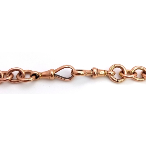 37 - A 9K ROSE GOLD VINTAGE TROMBONE ALBERT CHAIN WITH T BAR. MOST OF THE INDIVIDUAL LINKS ARE HALLMARKED... 