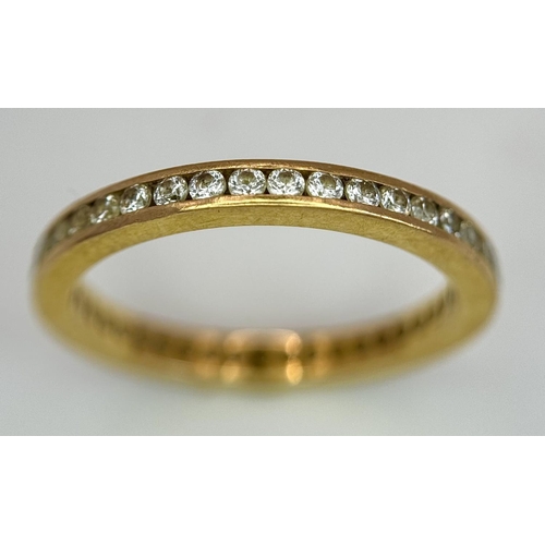 4 - A 22K YELLOW GOLD STONE SET FULL ETERNITY RING. 0.50CT. 2.7G SIZE N