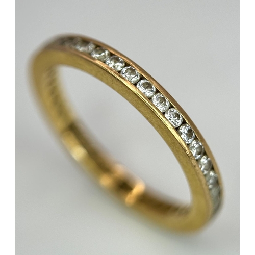 4 - A 22K YELLOW GOLD STONE SET FULL ETERNITY RING. 0.50CT. 2.7G SIZE N