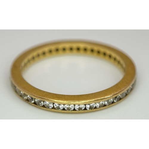 4 - A 22K YELLOW GOLD STONE SET FULL ETERNITY RING. 0.50CT. 2.7G SIZE N