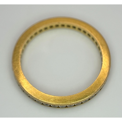 4 - A 22K YELLOW GOLD STONE SET FULL ETERNITY RING. 0.50CT. 2.7G SIZE N