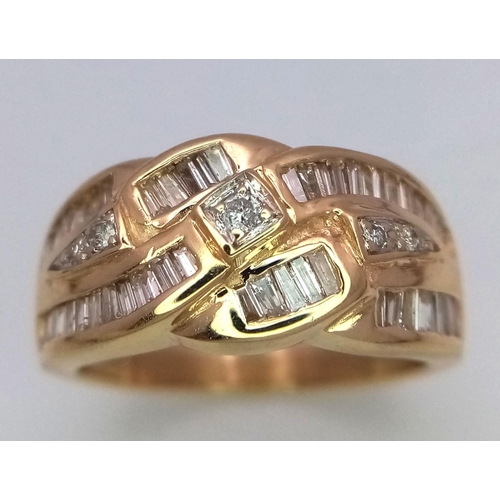 54 - A 14K YELLOW GOLD DIMAOND RING MIX OF BAGUETTEES AND ROUNDS. 0.65CT. 7.4G. SIZE O