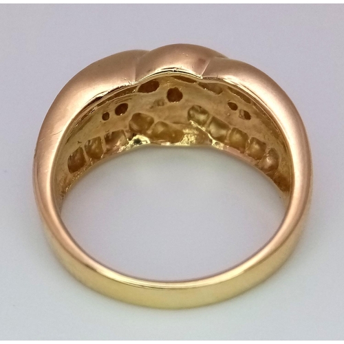 54 - A 14K YELLOW GOLD DIMAOND RING MIX OF BAGUETTEES AND ROUNDS. 0.65CT. 7.4G. SIZE O