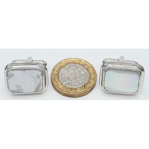 96 - A PAIR OF STERLING SILVER MOP SET CUFFLINKS. 15.6G