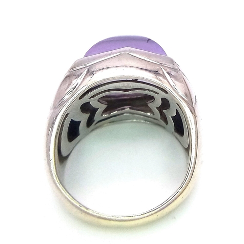 162 - An 18K White Gold Bulgari Amethyst Pyramid Ring. Size K.
16.41g total weight. Ref: 016531