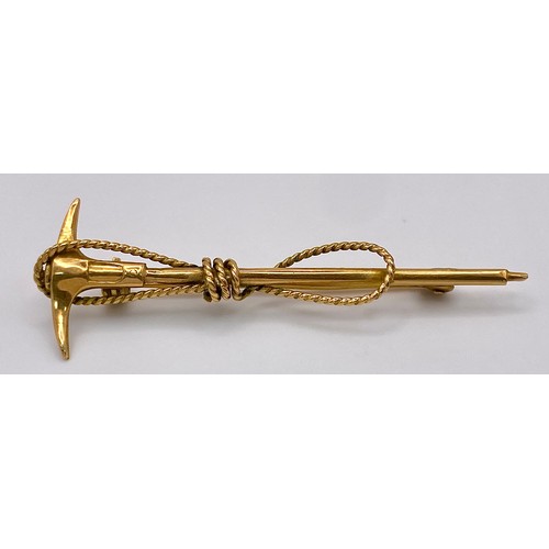 112 - A vintage, Swiss, 10 K yellow gold Mountaineering Ice Axe and Rope brooch. Traditionally these brooc... 