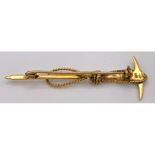 112 - A vintage, Swiss, 10 K yellow gold Mountaineering Ice Axe and Rope brooch. Traditionally these brooc... 