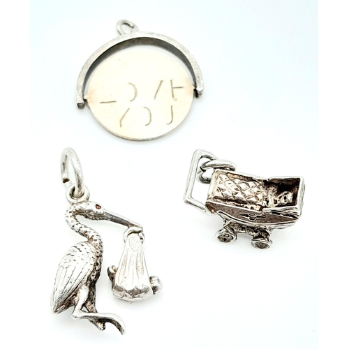 27 - 3 X STERLING SILVER NEW BABY THEMED CHARMS - PRAM, STALK CARRYING BABY, AND I LOVE YOU SPINNER. 4.4g... 