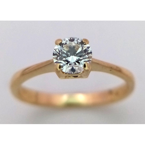 102 - AN 18K YELLOW GOLD DIAMOND SOLITAIRE RING - ROUND BRIILIANT CUT 0.40CT IN A 4 CLAW SETTING. 1.9G. SI... 