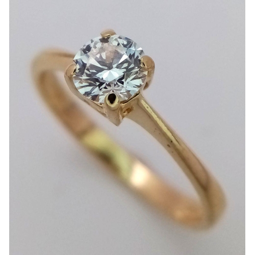 102 - AN 18K YELLOW GOLD DIAMOND SOLITAIRE RING - ROUND BRIILIANT CUT 0.40CT IN A 4 CLAW SETTING. 1.9G. SI... 