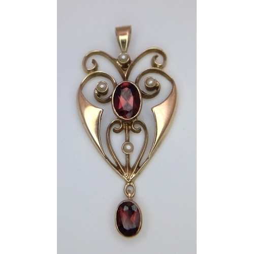 104 - Vintage 9 carat GOLD EDWARDIAN PENDANT.Gem set with Garnets and Seed Pearls. 3.1 grams. 4.0 cm drop.