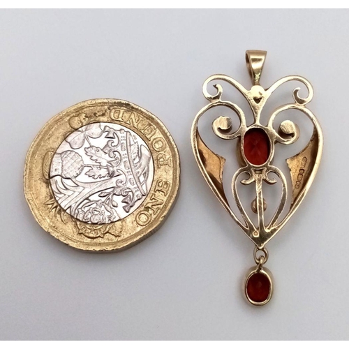 104 - Vintage 9 carat GOLD EDWARDIAN PENDANT.Gem set with Garnets and Seed Pearls. 3.1 grams. 4.0 cm drop.