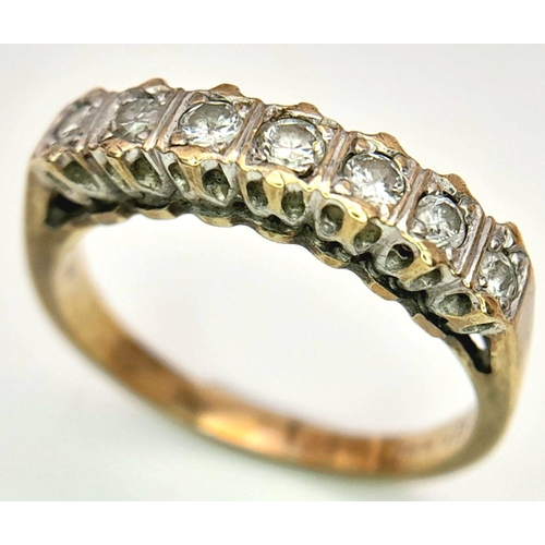 111 - 9 carat GOLD and DIAMOND RING. Having 7 x DIAMONDS  mounted to top with a fully hallmarked yellow GO... 