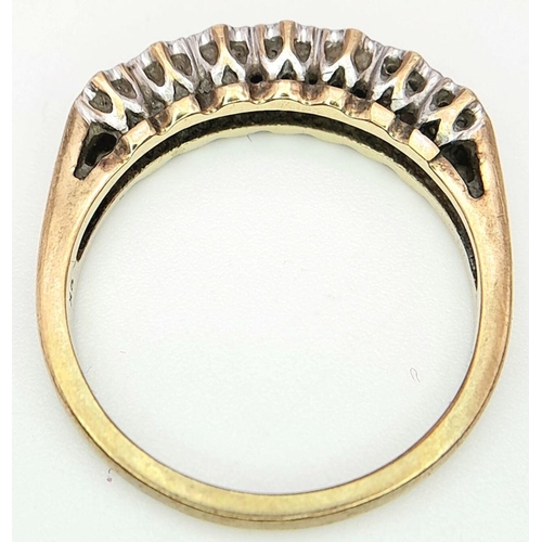 111 - 9 carat GOLD and DIAMOND RING. Having 7 x DIAMONDS  mounted to top with a fully hallmarked yellow GO... 