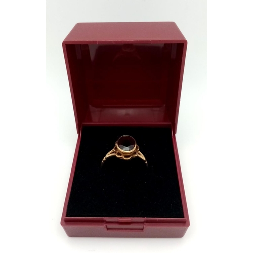 146 - Vintage 9 carat GOLD, GARNET set ring. Complete with ring box. 2.2 grams. Size N 1/2.