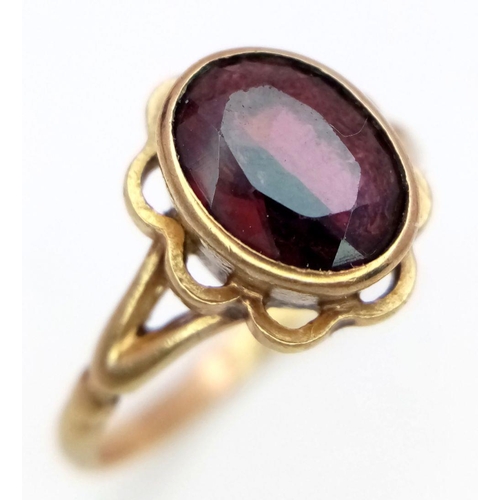 146 - Vintage 9 carat GOLD, GARNET set ring. Complete with ring box. 2.2 grams. Size N 1/2.