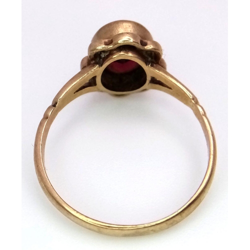 146 - Vintage 9 carat GOLD, GARNET set ring. Complete with ring box. 2.2 grams. Size N 1/2.