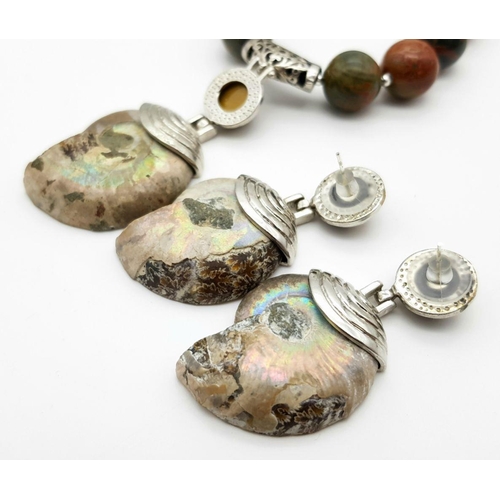 147 - An unusual jasper necklace with a Jurassic Ammonite from Madagascar, a bracelet, and a pair of match... 