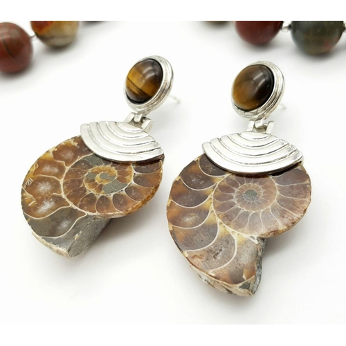 147 - An unusual jasper necklace with a Jurassic Ammonite from Madagascar, a bracelet, and a pair of match... 