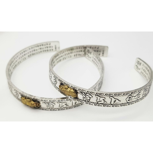 203 - A Feng Sui group of items:
Two bracelets with Chinese characters (his & hers)
Two rings with Chinese... 