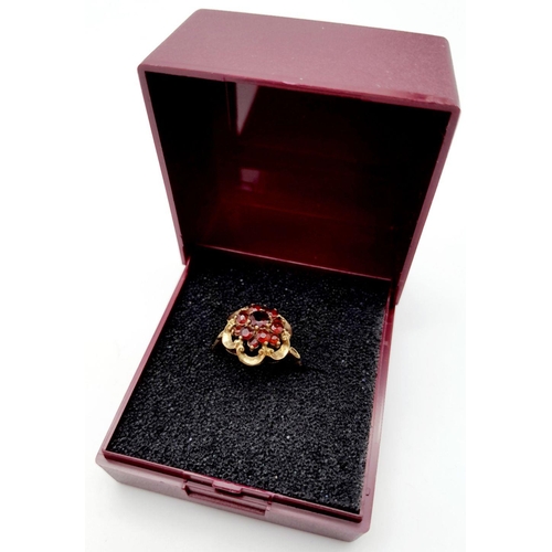 216 - Vintage 9 carat GOLD,GARNET CLUSTER RING with lovely GOLD COLLAR SURROUND.Full UK hallmark.Complete ... 