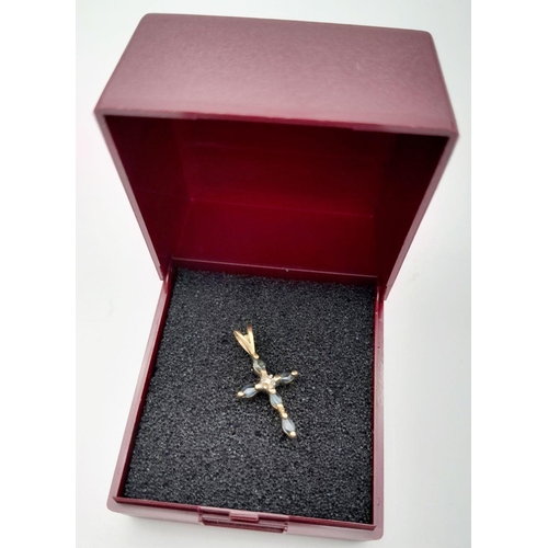 244 - Beautiful 9 carat GOLD ,SAPPHIRE and DIAMOND CROSS PENDANT. Dainty and delicate. 0.8 grams. 2.2 cm x... 